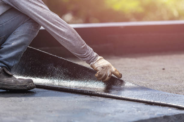 Professional Waterproofing technician working in Evart, MI
